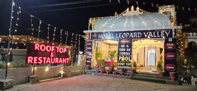Hotel Leopard Valley entrance illuminated at night