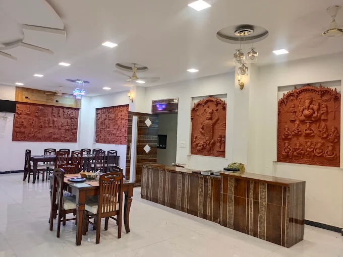 Rajasthani terracotta wall art in the dining and reception area